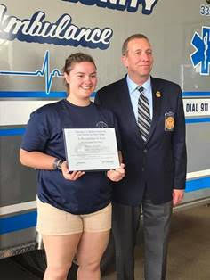 Megan Amacher of Sanborn honored at the Tri-Community Ambulance Company.